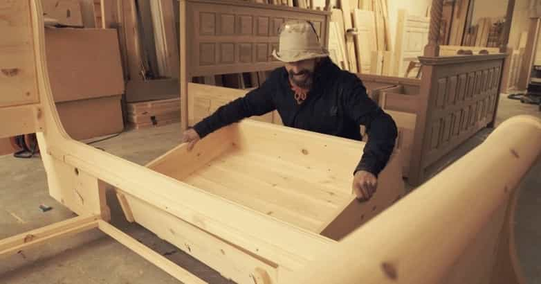 Revival Beds craftsman making a bed